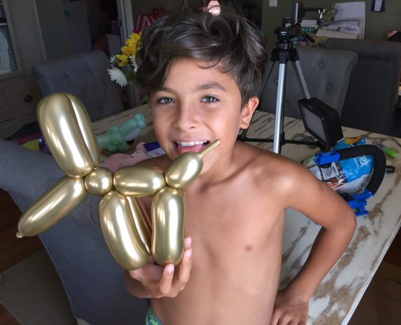 boy with balloon dog - massachusetts